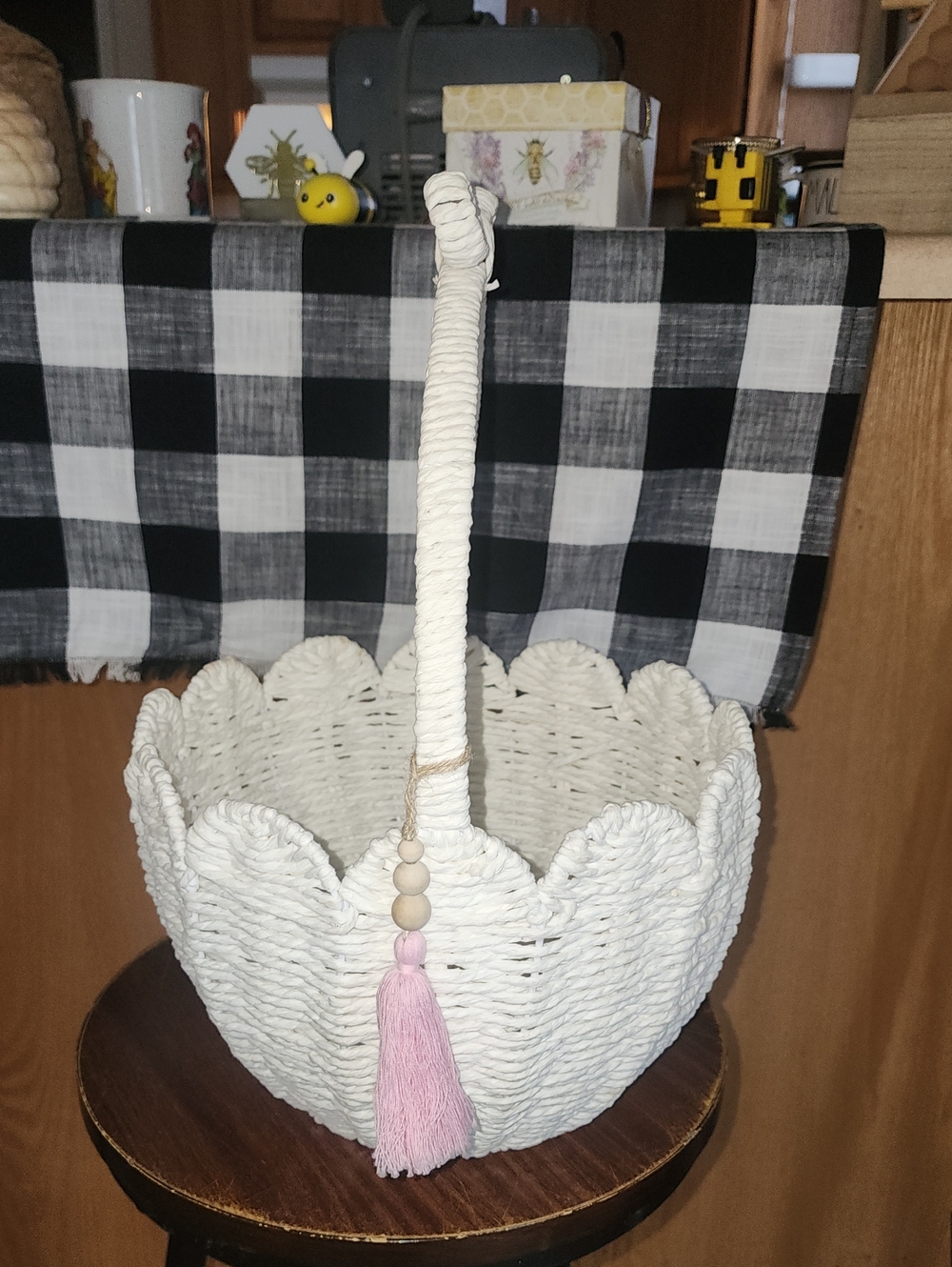 White Woven Scalloped Basket with Handle and Pink Tassel